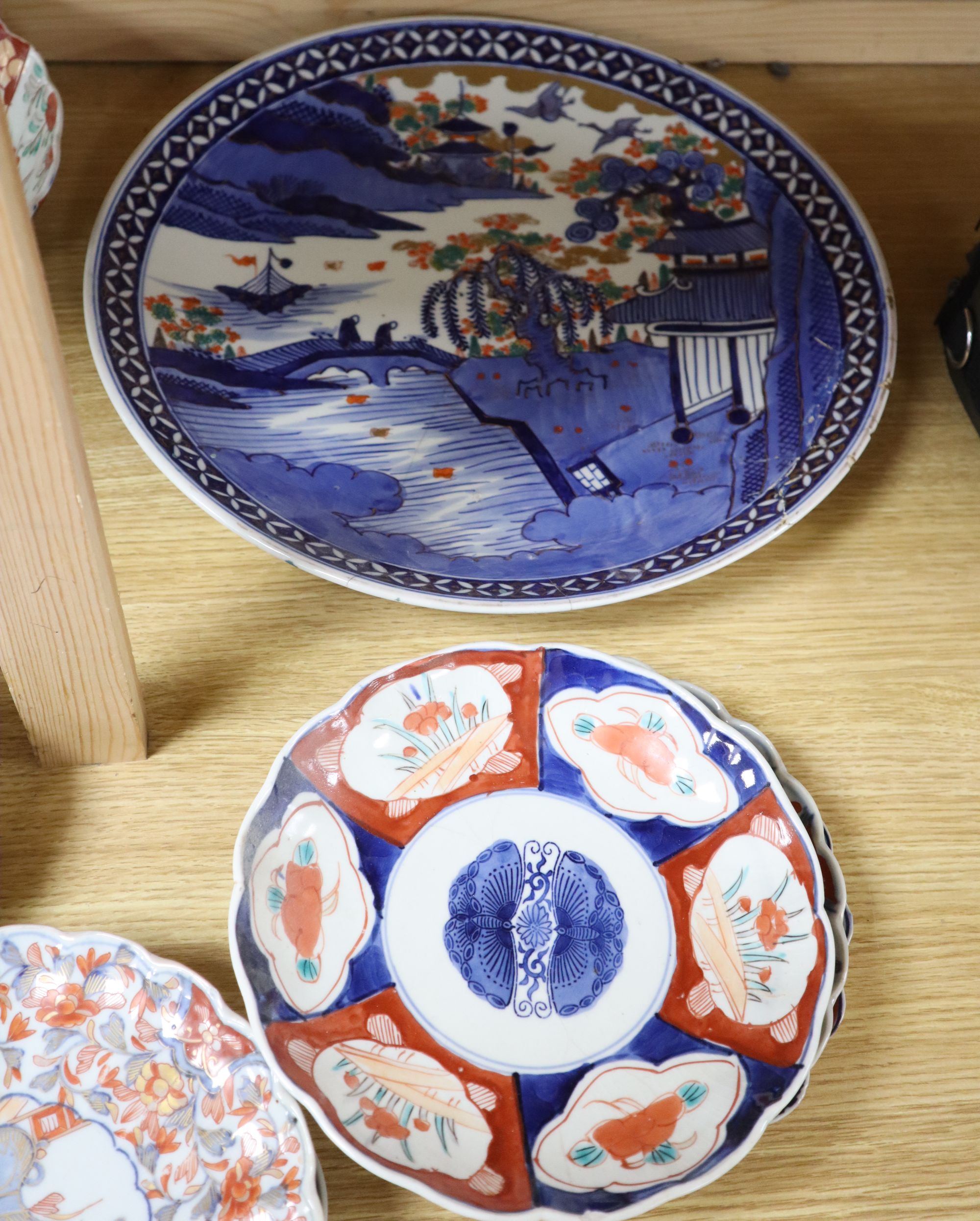 A collection of Japanese Imari dishes, bowls and a large square dish